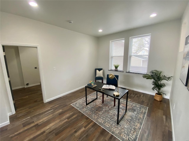 office space with dark wood finished floors, recessed lighting, and baseboards
