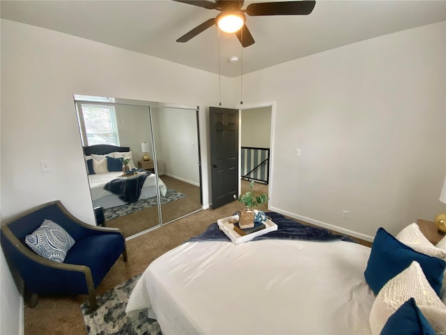 bedroom featuring a closet, baseboards, carpet, and ceiling fan