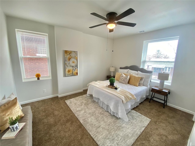 bedroom featuring visible vents, carpet flooring, a ceiling fan, and baseboards