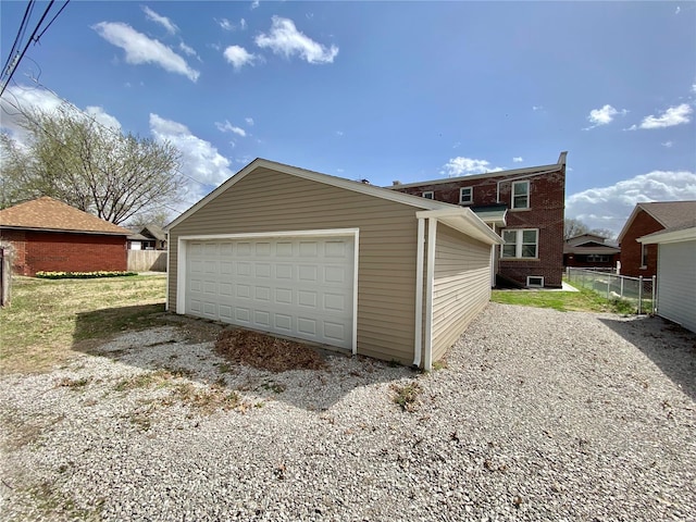 detached garage with fence