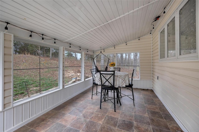 sunroom with wood ceiling and vaulted ceiling