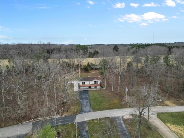 birds eye view of property featuring a rural view