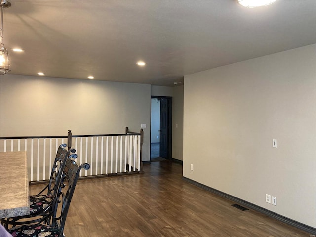 interior space with visible vents, recessed lighting, baseboards, and wood finished floors