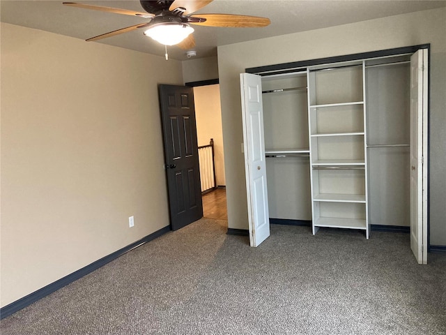 unfurnished bedroom with a closet, baseboards, and a ceiling fan