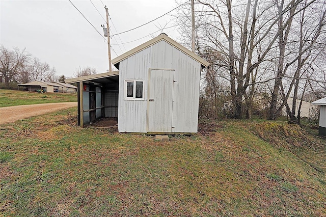 view of outbuilding featuring an outdoor structure