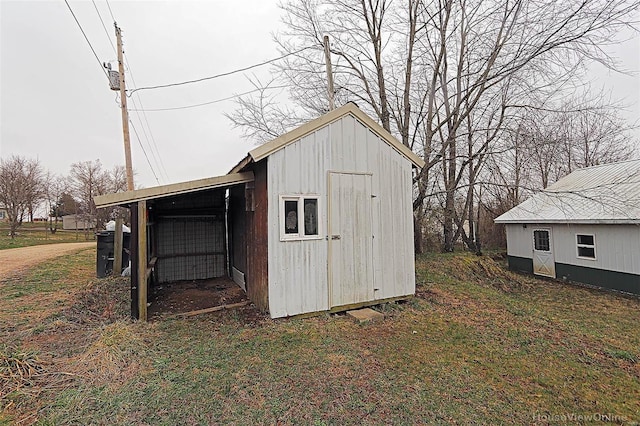 view of outbuilding with an outbuilding