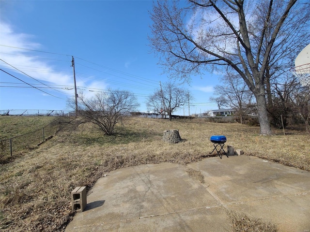 view of yard featuring a patio area and fence