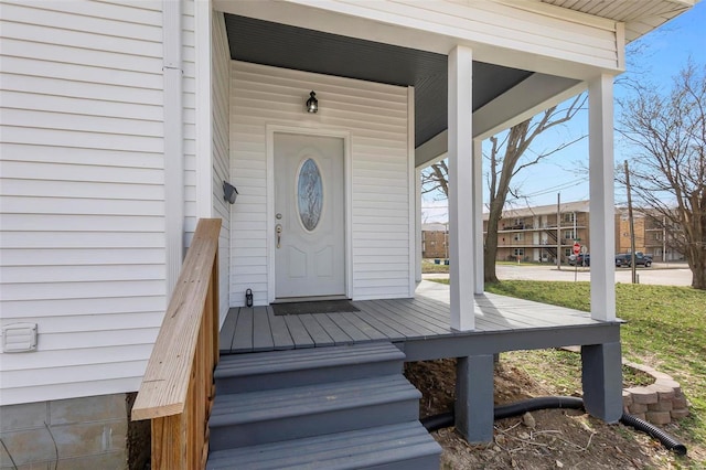 doorway to property featuring a porch