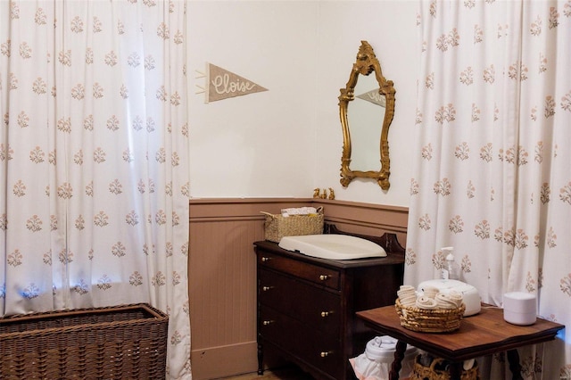 bathroom with wainscoting and vanity