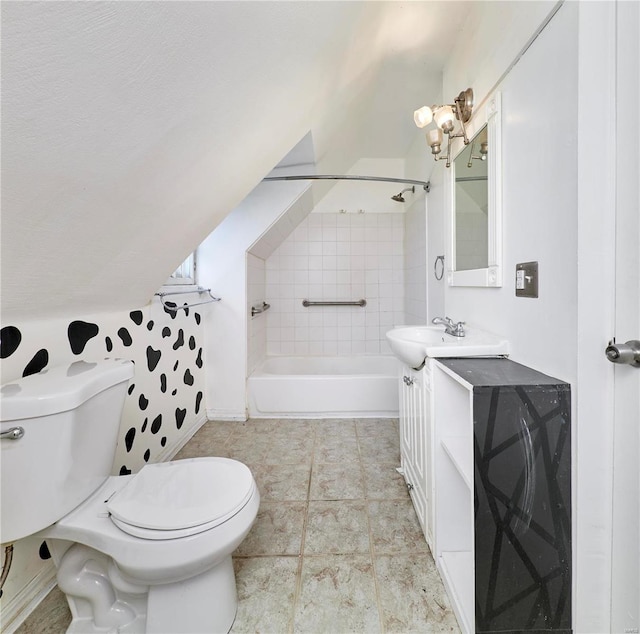 full bath with toilet, tile patterned floors, vanity, bathing tub / shower combination, and vaulted ceiling