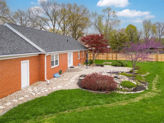 view of yard with a patio area and fence