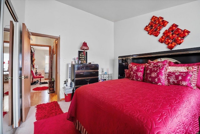 bedroom featuring wood finished floors