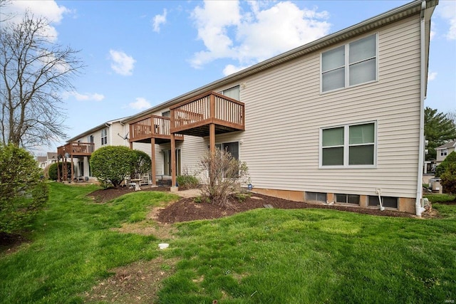 back of property with a yard
