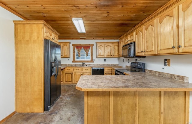 kitchen with a sink, a peninsula, light countertops, black appliances, and wooden ceiling