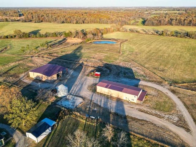 bird's eye view with a rural view and a water view