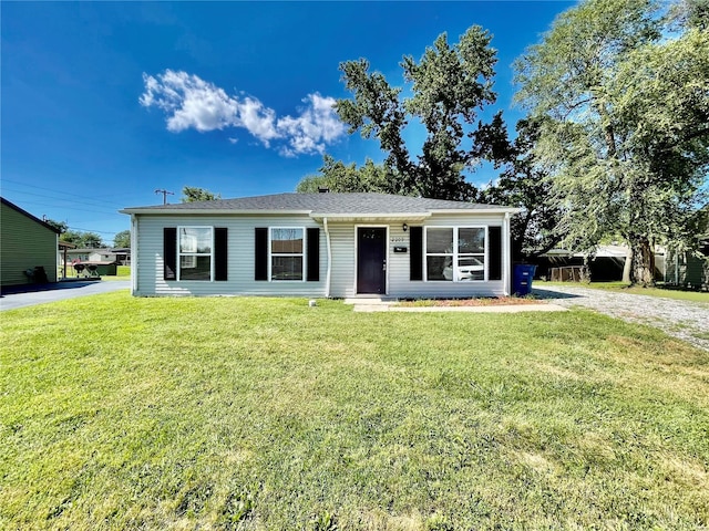 view of front of home featuring a front yard