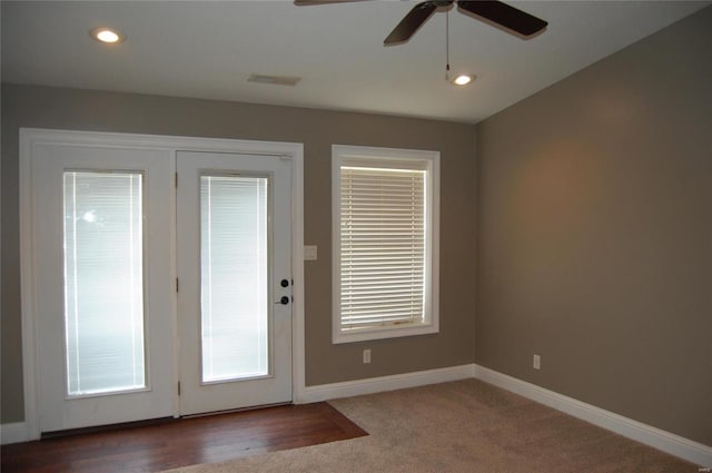 doorway to outside with visible vents, recessed lighting, baseboards, and a ceiling fan