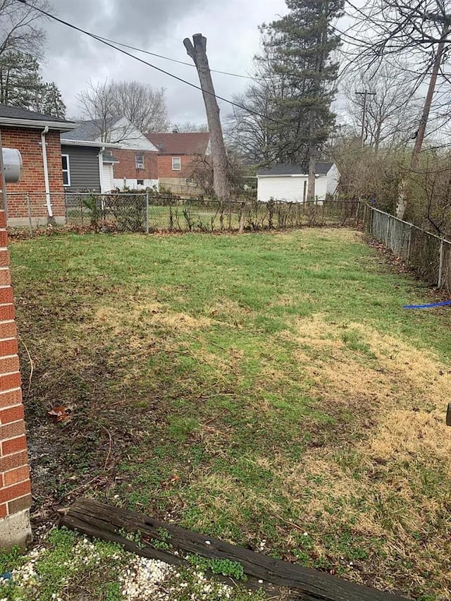 view of yard with fence