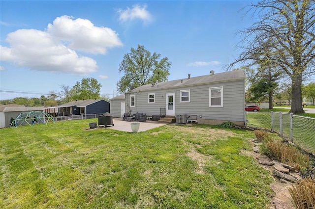 back of property featuring cooling unit, a patio, entry steps, a yard, and a fenced backyard