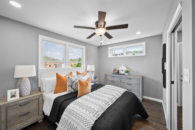 bedroom featuring recessed lighting, baseboards, ceiling fan, and dark wood-type flooring