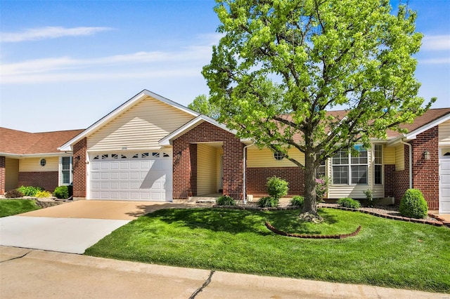 ranch-style house featuring an attached garage, a front lawn, brick siding, and concrete driveway