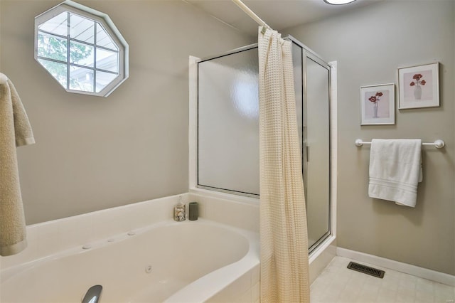 full bath featuring a whirlpool tub, a shower stall, visible vents, and baseboards