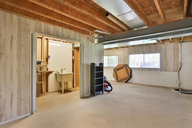 basement featuring a sink