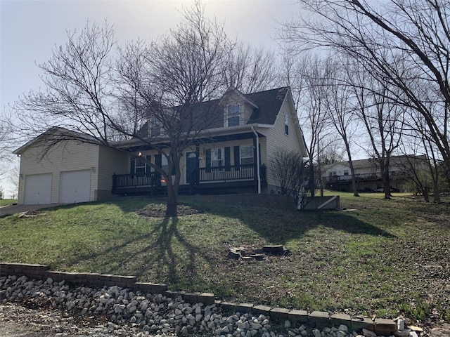 view of front of property with a garage and a front lawn