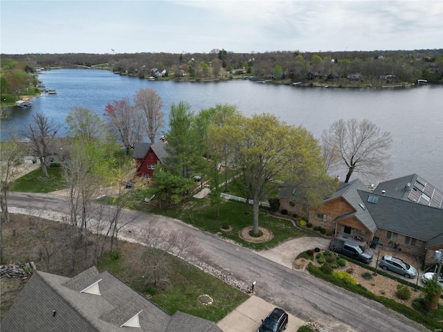 drone / aerial view with a water view