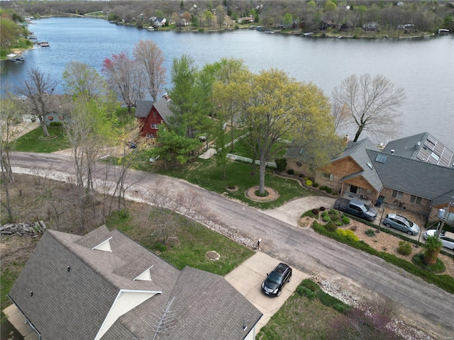 bird's eye view with a water view