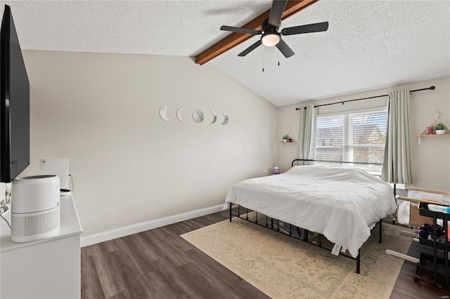 bedroom featuring lofted ceiling with beams, baseboards, a textured ceiling, and wood finished floors