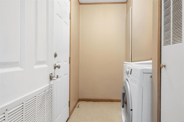 laundry room with separate washer and dryer, baseboards, a heating unit, and laundry area