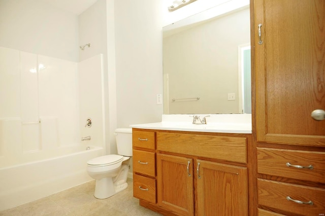 full bath featuring vanity, tile patterned flooring, washtub / shower combination, and toilet