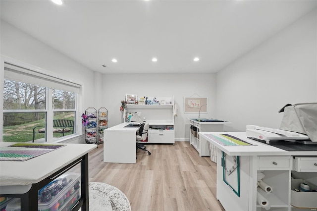 home office featuring baseboards, light wood-type flooring, wine cooler, and recessed lighting