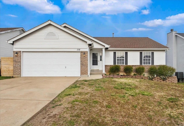 ranch-style house featuring concrete driveway, brick siding, a garage, and a front lawn