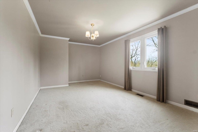 carpeted empty room featuring a notable chandelier, visible vents, and baseboards