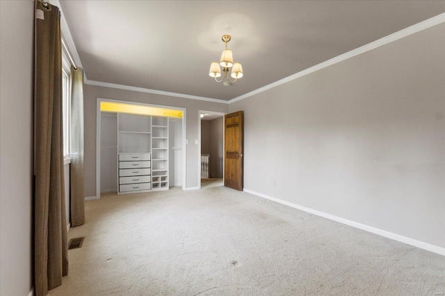 unfurnished bedroom with a chandelier, visible vents, baseboards, and crown molding