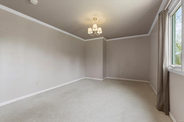 unfurnished room with ornamental molding, a wealth of natural light, and a notable chandelier