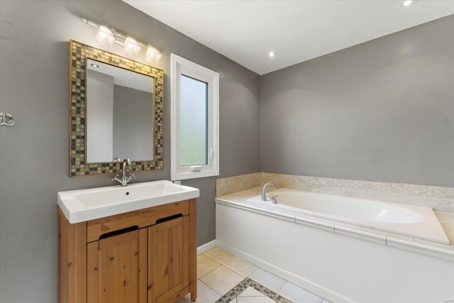 full bathroom featuring a bath, vanity, tile patterned flooring, and recessed lighting