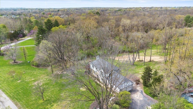 aerial view featuring a forest view