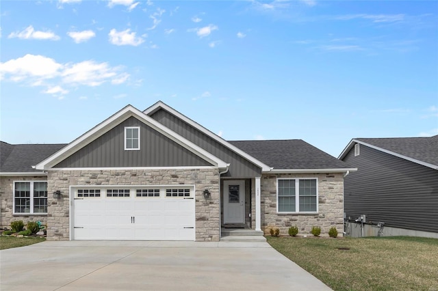 craftsman-style home featuring roof with shingles, a garage, stone siding, and concrete driveway