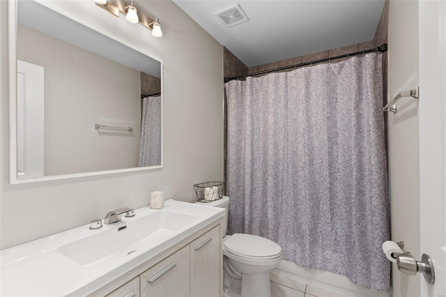 bathroom with visible vents, toilet, a shower with curtain, and vanity