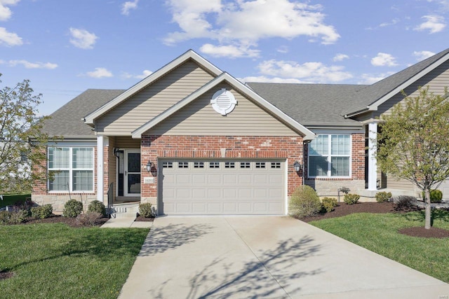 ranch-style home featuring brick siding, a garage, concrete driveway, and a front yard