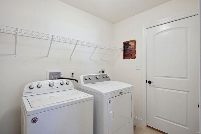 laundry area with independent washer and dryer and laundry area