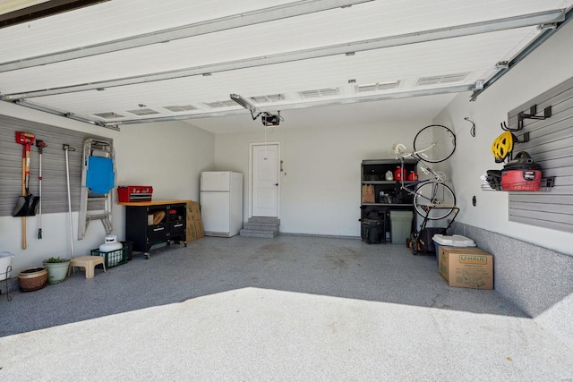 garage with freestanding refrigerator
