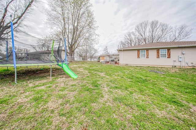view of yard featuring a trampoline