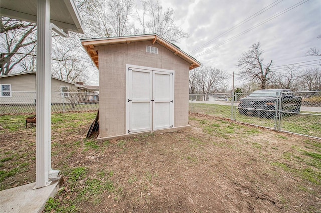 view of shed featuring a fenced backyard