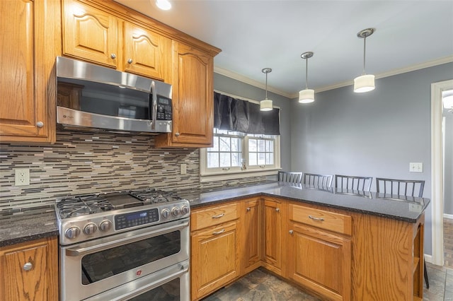 kitchen with hanging light fixtures, tasteful backsplash, crown molding, and appliances with stainless steel finishes