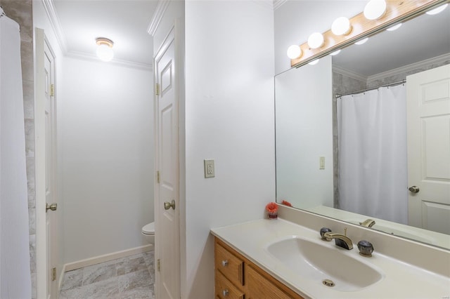 full bath featuring vanity, baseboards, toilet, and crown molding