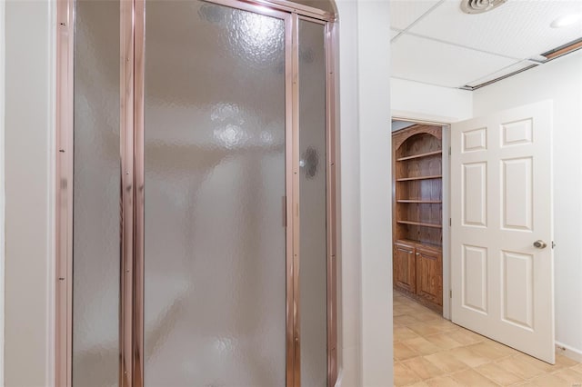 full bath featuring a shower stall
